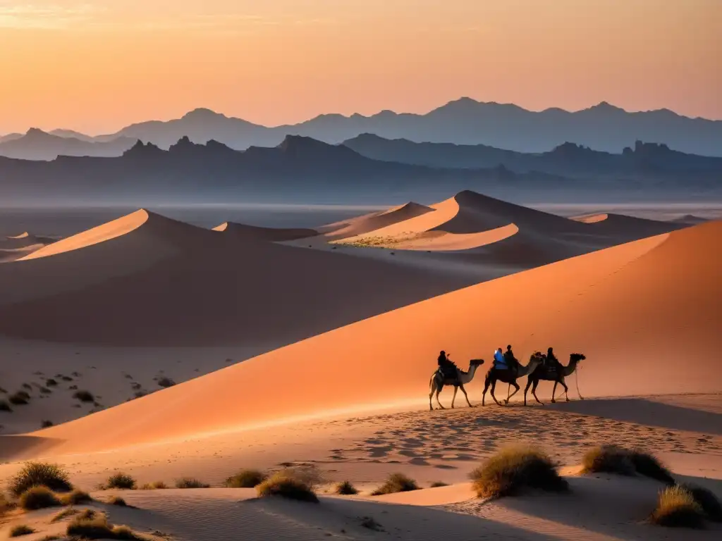 Caravana al amanecer en el desierto: poesía preislámica Desierto al amanecer, con el sol dorado asomando sobre las dunas y una caravana de camellos