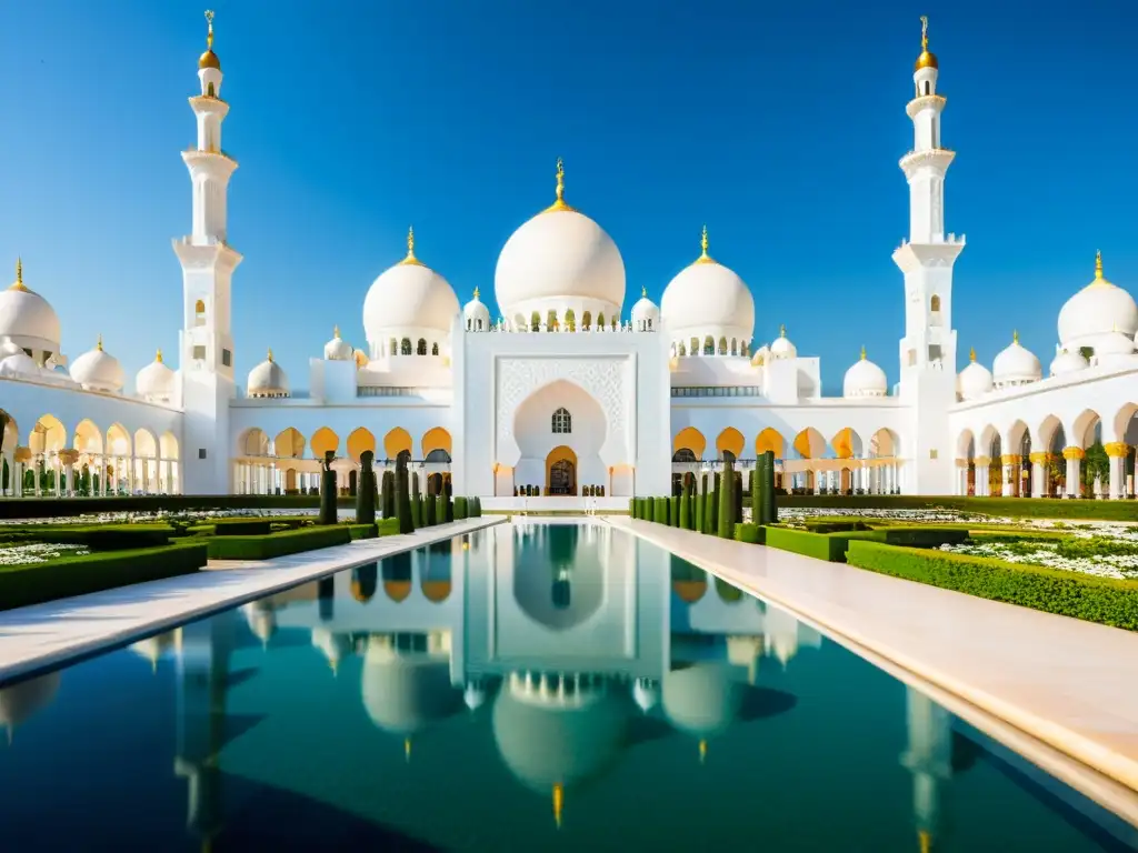 Vista detallada de la majestuosa Mezquita Sheikh Zayed en Abu Dhabi, con sus cúpulas blancas y minaretes imponentes, bañados por la luz dorada del sol