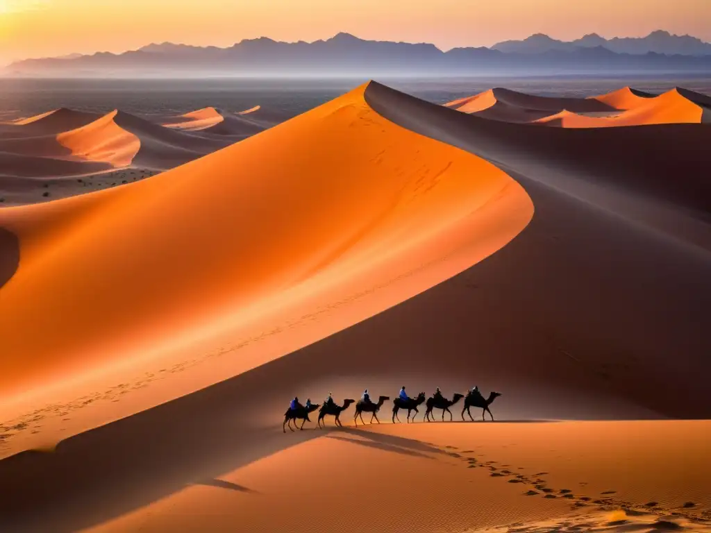 Vista panorámica del desierto árabe al atardecer, con camellos en la distancia